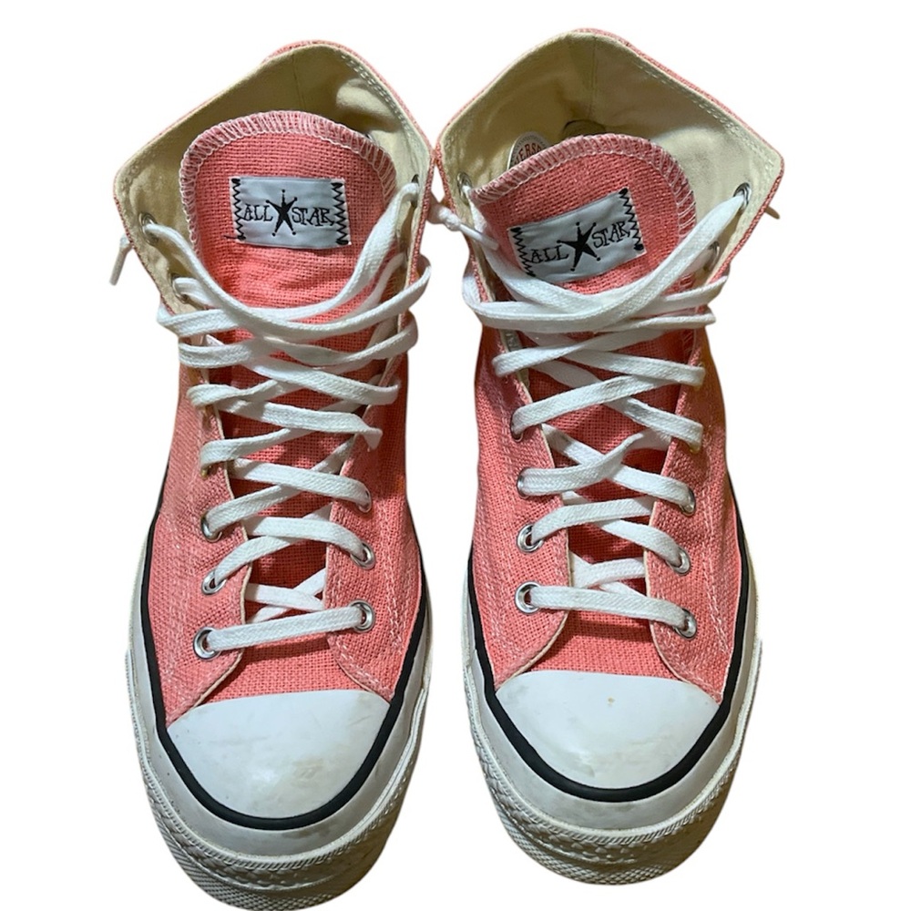 Stussy x Converse Chuck 70 High ‘Surfman’ 
Pink high top Converse trainers